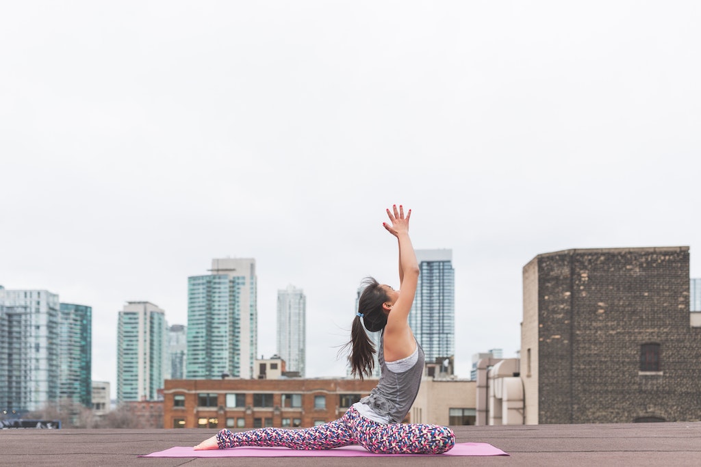 woman stretching outside