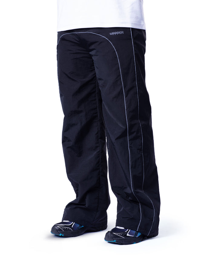Trackpants in Schwarz UPPPER